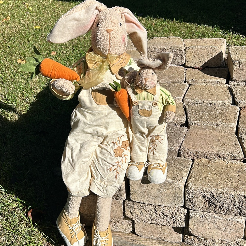 Sitting bunny with a small standing bunny